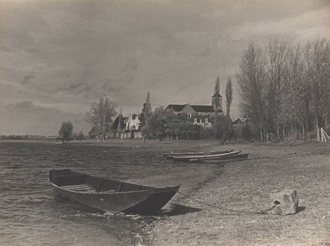 Boat tethered to shore.