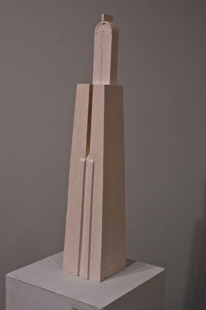 Tall and narrow geometric architectural porcelain sculpture with four sides