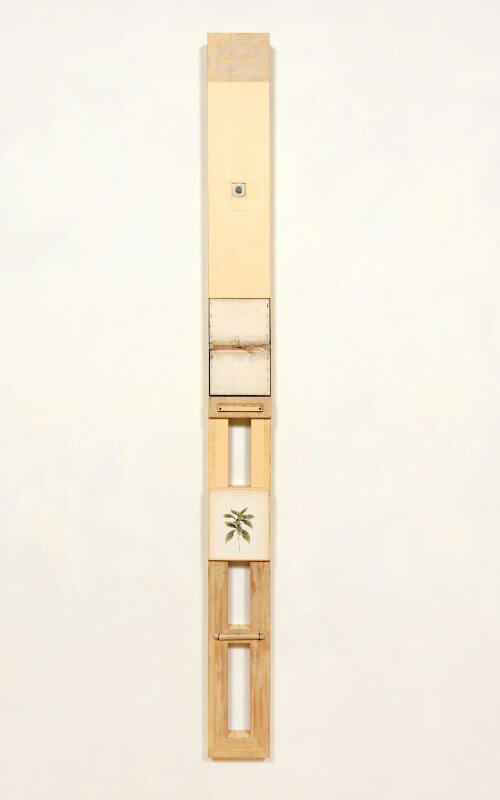 A vertical, mixed-media artwork with sections of wood, fabric, and a botanical illustration.