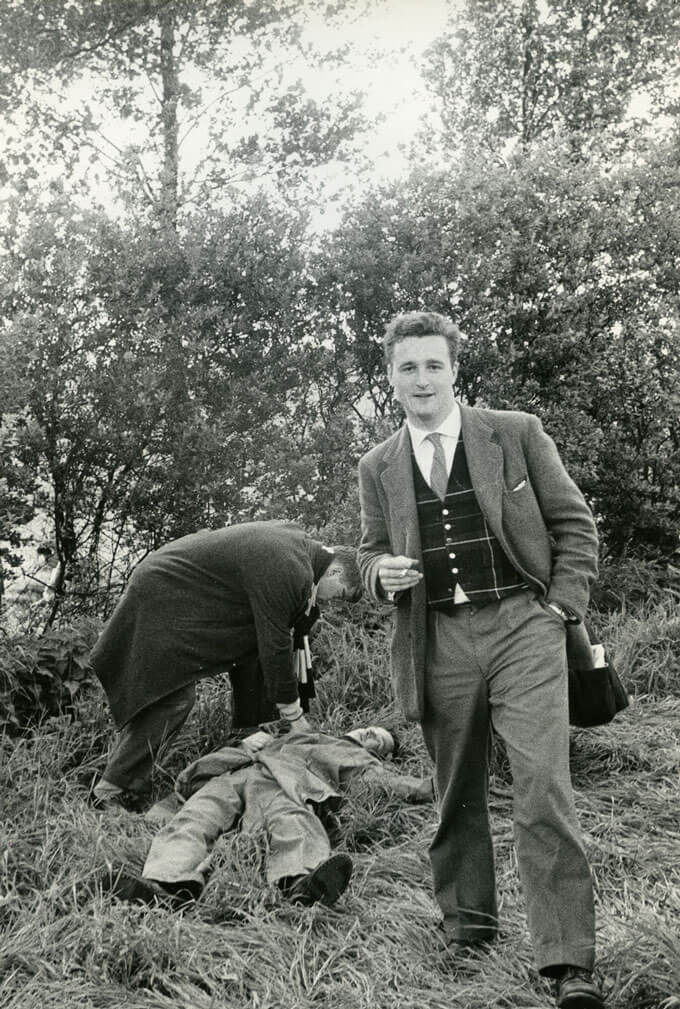 Drunken university students play-fighting at rowing races (Utrecht, Holland)